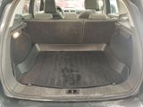 a trunk of a car with the back seats folded down