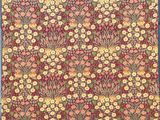 un motif floral rouge et jaune sur fond bleu