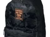 black backpack with red eagle patch on the front