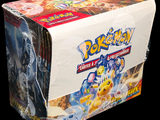 a box of pokemon trading cards on a black background