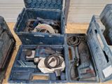 a tool box with tools in it sitting on the floor