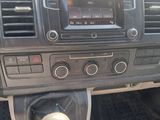 a dashboard of a car with a radio in it