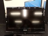 an image of a television set with remote control