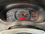 a close up of a car dashboard with a speedometer