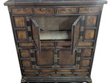 an image of a wooden cabinet with a marble top