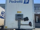 a delivery truck that is parked in the parking lot