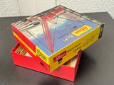 two boxes that are stacked on top of each other