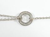 a close up of a chain with a circle on it