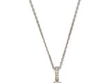 a yellow sapphire and diamond pendant on a chain