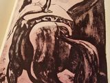 a drawing of a man riding a horse in a book