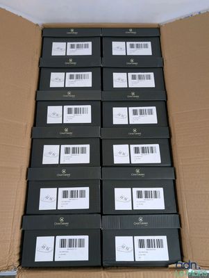 the boxes are stacked on top of each other in a cardboard box