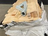 a pile of wood sitting on top of a pallet