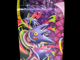 a plastic bag with a picture of a pokemon figure inside of it