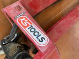 a close up of a clamp on a piece of wood