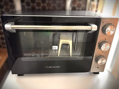 a toaster oven sitting on top of a counter