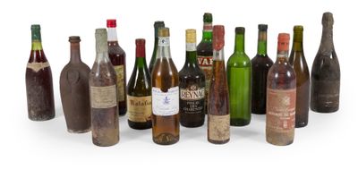many bottles of wine that are lined up in a row