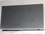 une photo d'une télévision à écran plat montée sur un mur