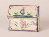 a small box with a picture of a woman on it