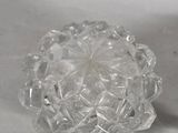 pair of clear glass vases on a white table cloth