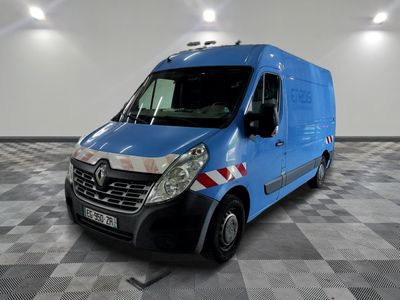 la photo d'une camionnette bleue garée dans un garage