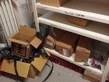 a pile of boxes sitting on the floor in a room