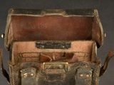 an old suitcase that is sitting on a table