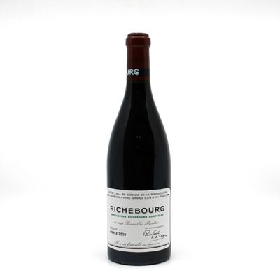 a bottle of wine that is sitting on a table