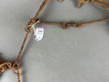 a close up of a rope with a tag attached to it