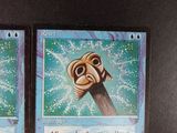 two cards that are sitting on a table