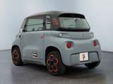 an image of a small electric car in a room