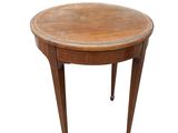 an image of a small round table with a wooden top