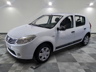 a picture of a white car parked in a garage