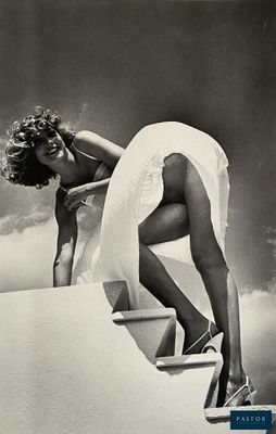 black and white photograph of a woman in a white dress climbing up a set of stairs