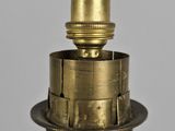 a close up view of a brass colored water faucet