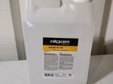 an image of a gallon of liquid sitting on a table