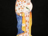 an image of a statue of a woman holding a child