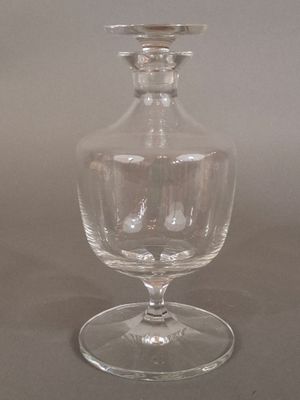 a clear glass vase sitting on a table