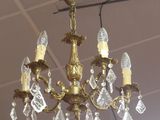 a chandelier that is hanging from the ceiling
