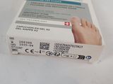 packaging of a box of foot gel sitting on top of a white table