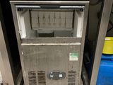 an image of a commercial ice cream machine in a kitchen