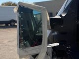 a mirror on the side of a car that is broken