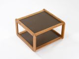 an image of a wooden table with a glass top on a white background