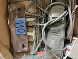 a cardboard box full of assorted electrical equipment