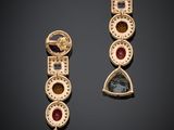 a pair of gold earrings with multi colored stones