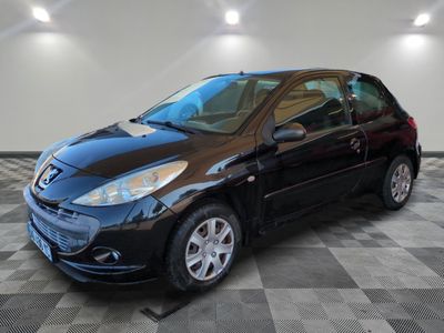 a picture of a black car parked in a garage