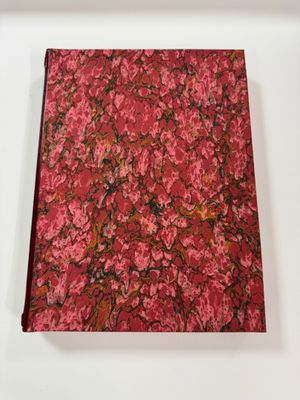 an image of a red book with red flowers on it