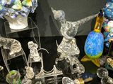 a lot of glass figurines sitting on a table