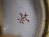 a close up of a plate with the word lee written on it