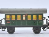 two toy trains on a white surface with a white background