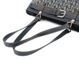 the purse is sitting on a white surface with a strap around it